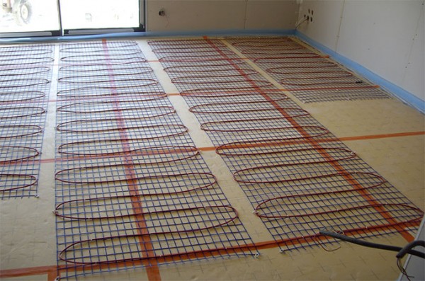 Peut-on poser un poêle sur un plancher chauffant électrique?